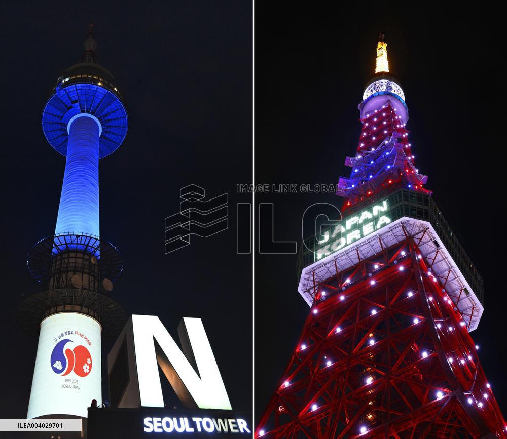 Tokyo Tower and N Seoul Tower lit up