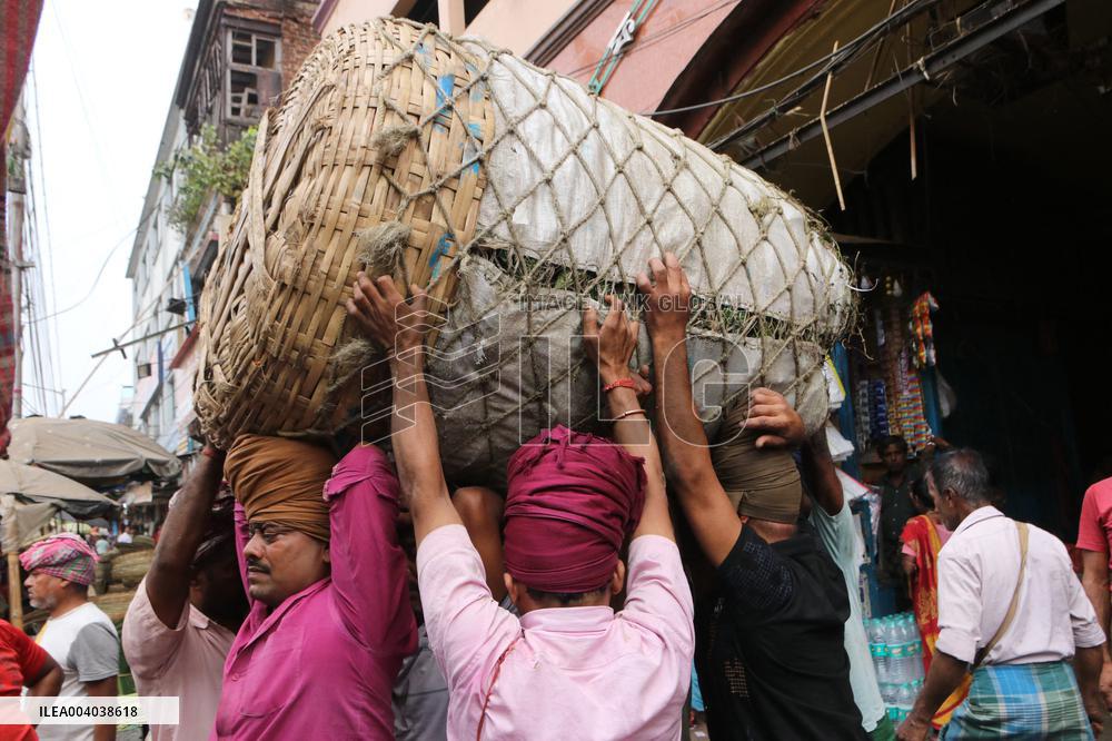 Labourers Unloading Vegetables Bags - India