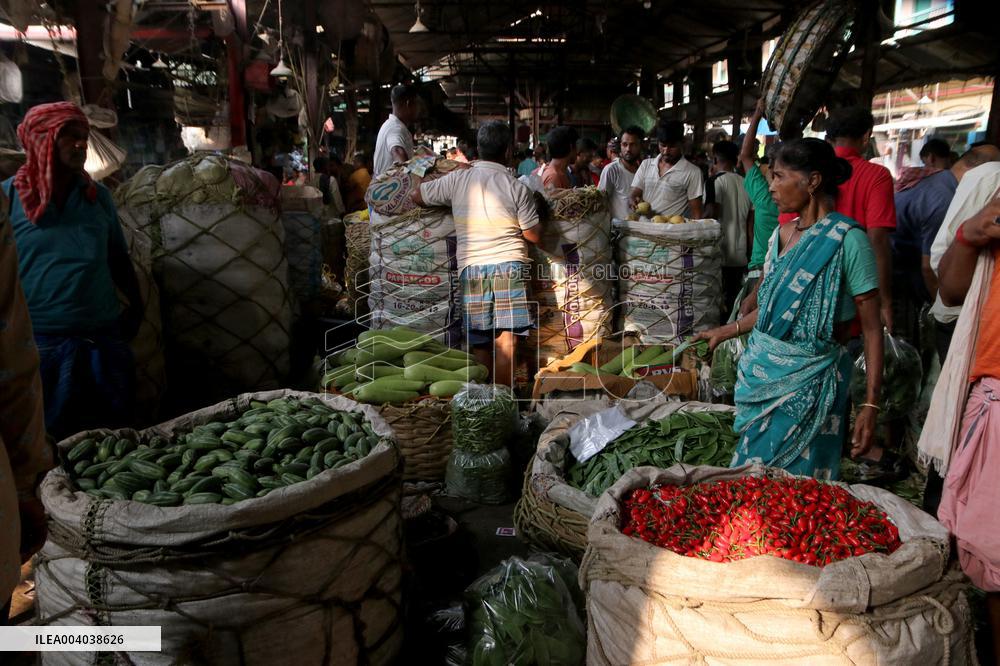 Labourers Unloading Vegetables Bags - India