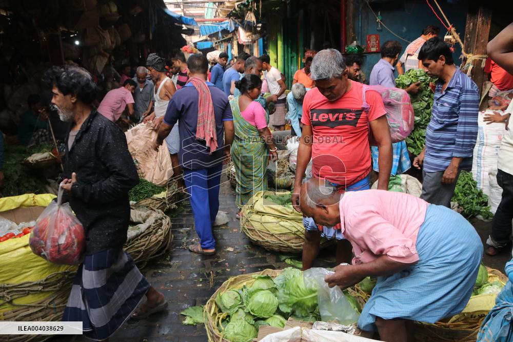 Labourers Unloading Vegetables Bags - India