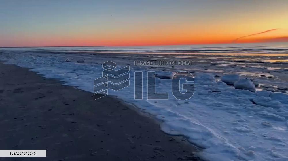 US: Stunning Sunrise Shot At Snow-Covered Beach In Maine