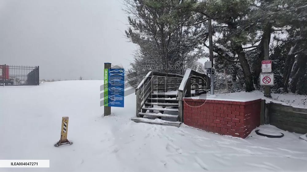 US: Snow-Covered Beach Scene Captured In Norfolk, Virginia