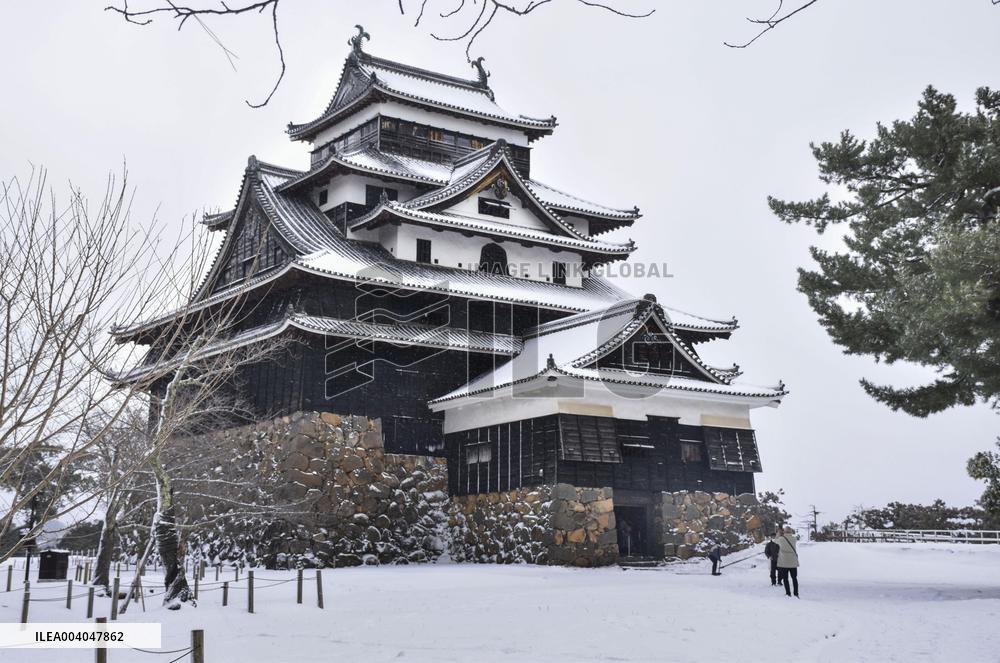 Snow-covered castle in Japan