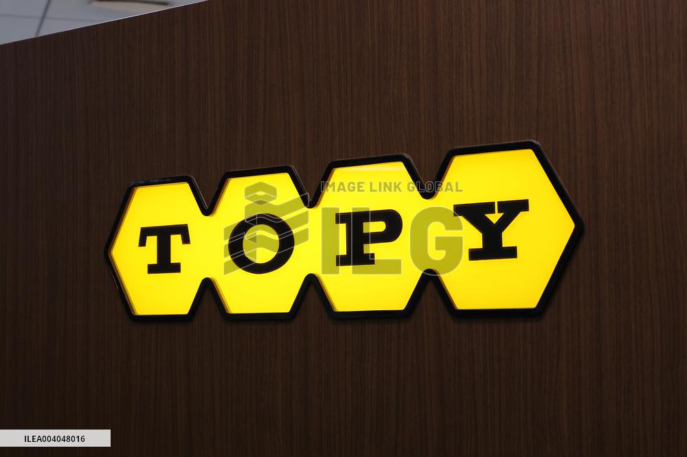 Topy Industries signage and logo