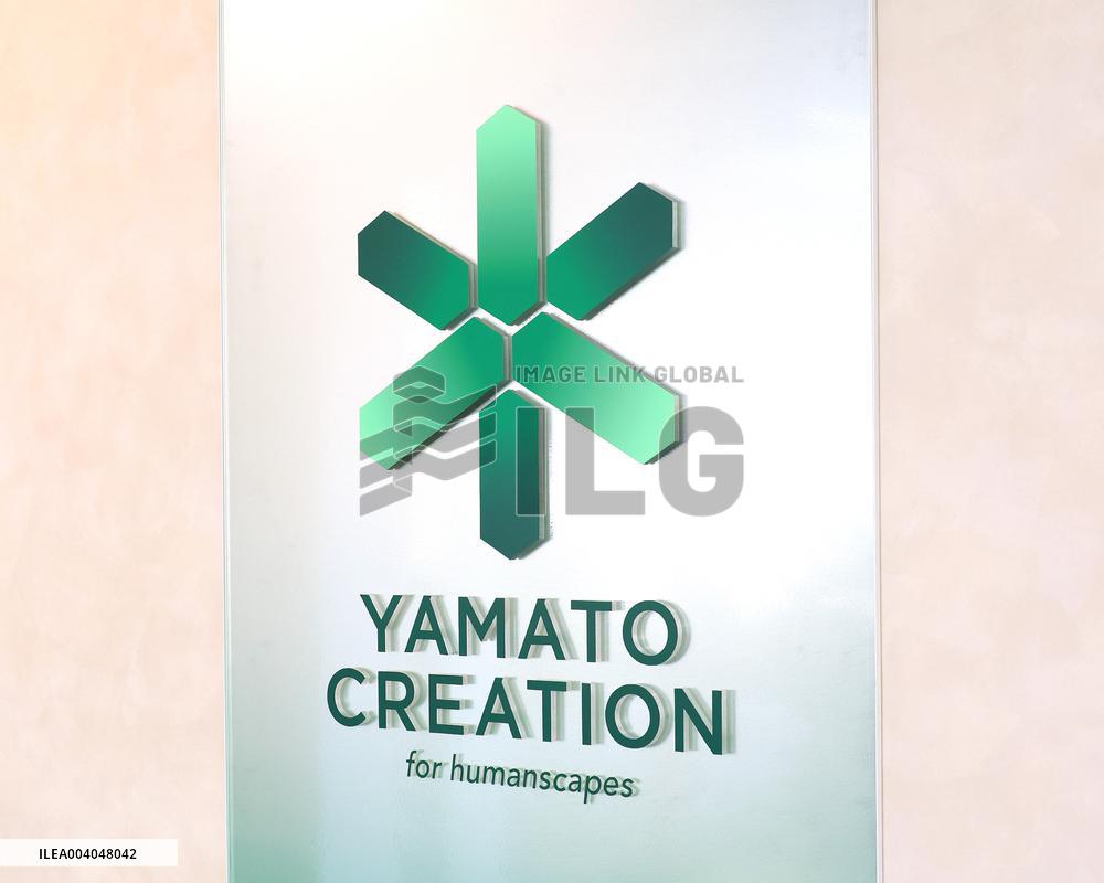Yamato Creation signage and logo