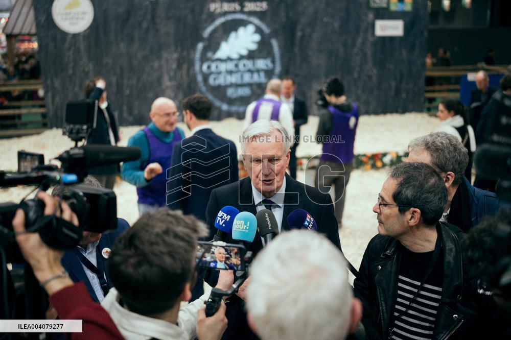 Former French Prime Michel Barnier visits the Agricultural Show - Paris AJ