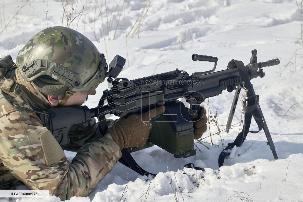 Ukraines Khartiia Brigade infantry personnel test out new weapons