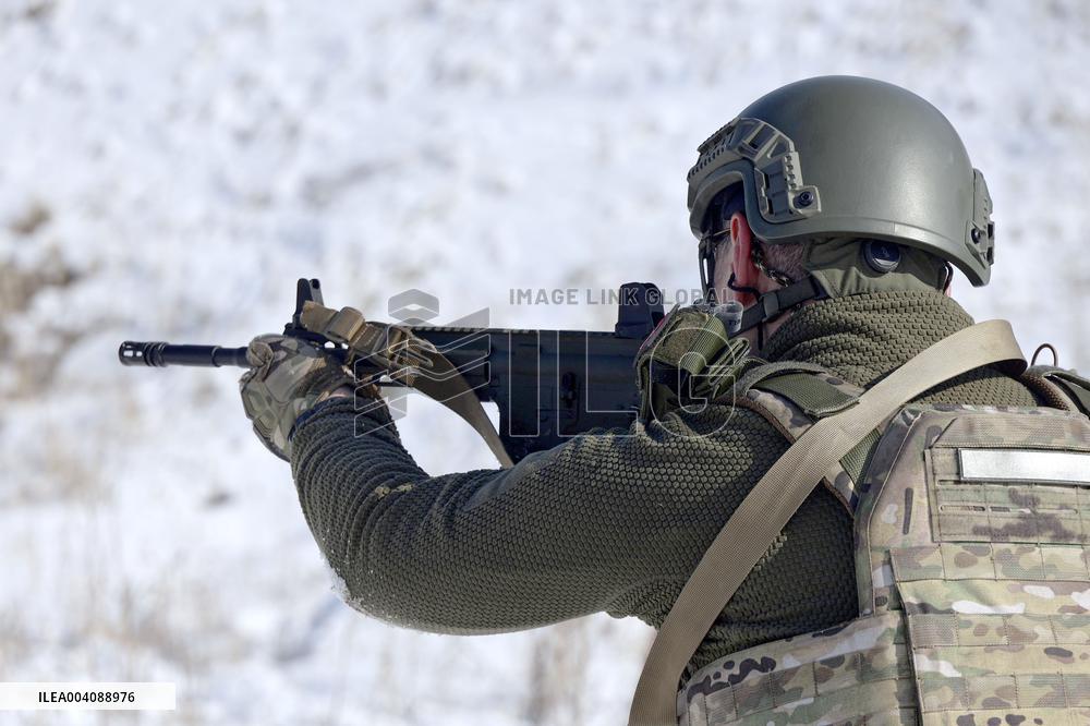 Ukraines Khartiia Brigade infantry personnel test out new weapons