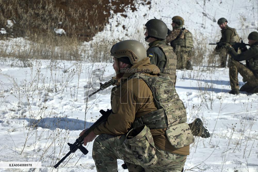 Ukraines Khartiia Brigade infantry personnel test out new weapons