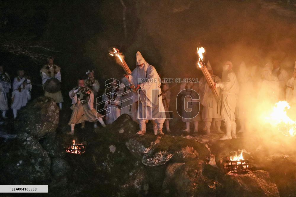 Ritual to pour holy water into river in Japan