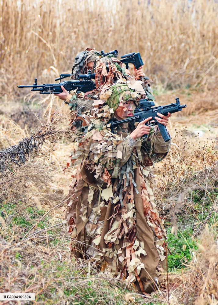 A Reconnaissance Team Exercises at A Field Comprehensive Training Base