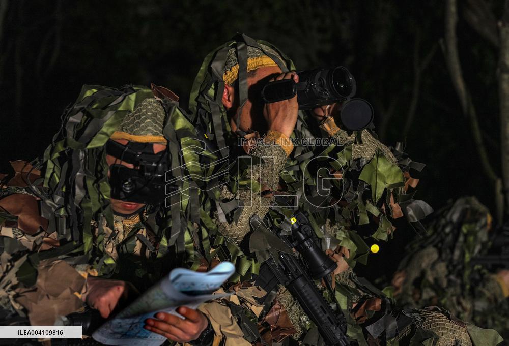 A Reconnaissance Team Exercises at A Field Comprehensive Training Base