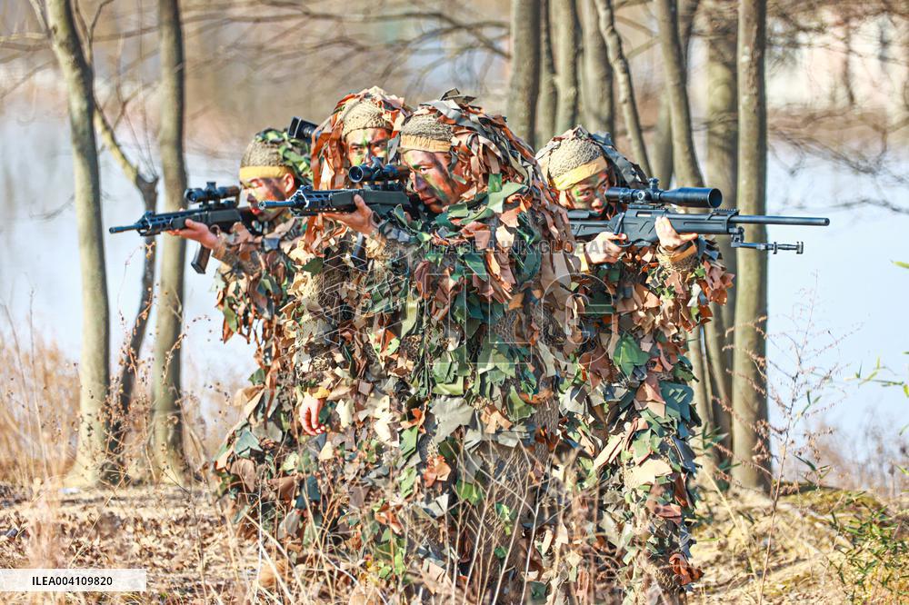 A Reconnaissance Team Exercises at A Field Comprehensive Training Base