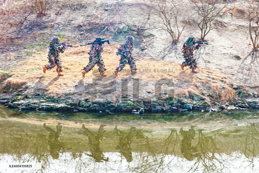 A Reconnaissance Team Exercises at A Field Comprehensive Training Base