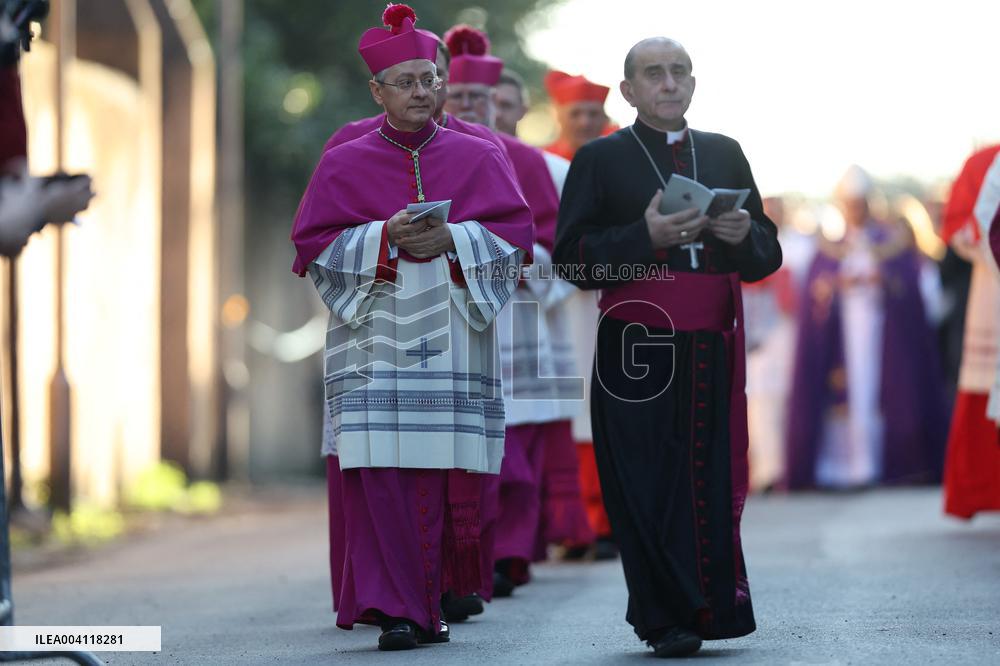 Religion: Cardinals and bishops preceded by the penitential procession from the Basilica of Sant'Anselmo towards the Basilica of