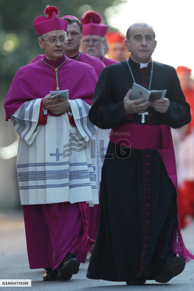 Religion: Cardinals and bishops preceded by the penitential procession from the Basilica of Sant'Anselmo towards the Basilica of