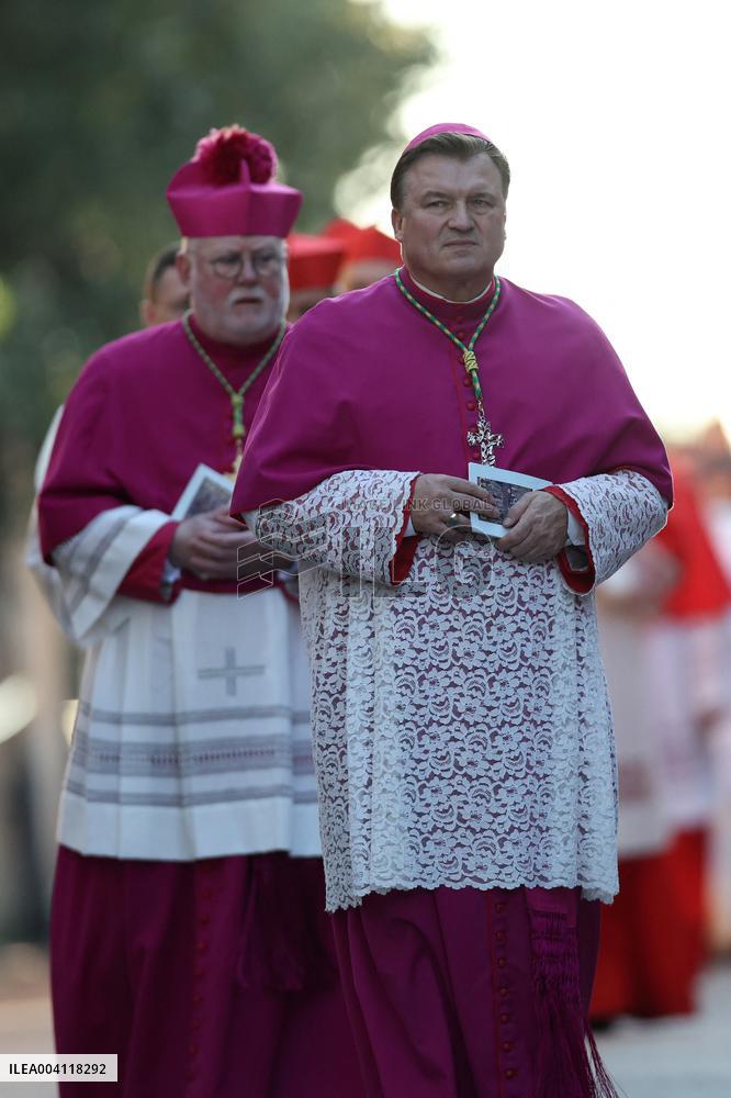 Religion: Cardinals and bishops preceded by the penitential procession from the Basilica of Sant'Anselmo towards the Basilica of