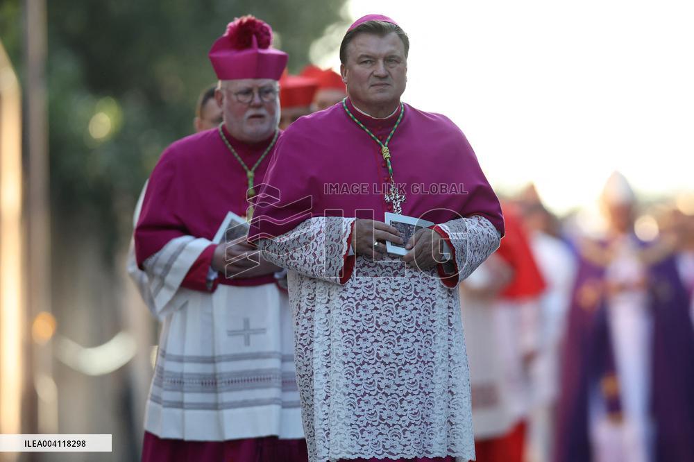 Religion: Cardinals and bishops preceded by the penitential procession from the Basilica of Sant'Anselmo towards the Basilica of