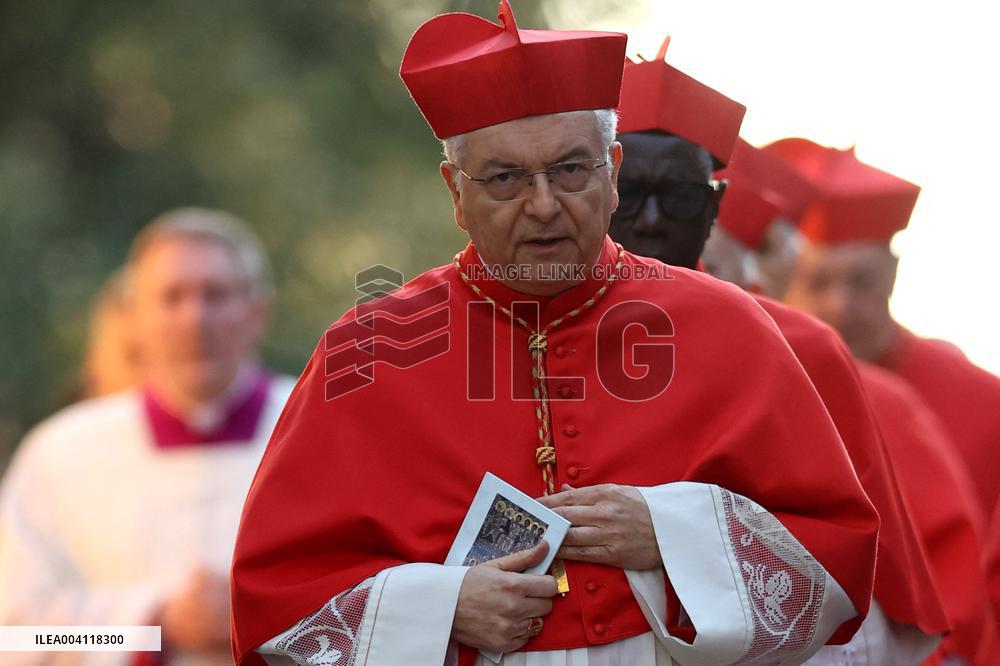 Religion: Cardinals and bishops preceded by the penitential procession from the Basilica of Sant'Anselmo towards the Basilica of