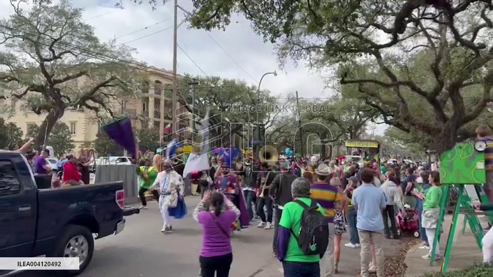 US: People Celebrate Mardi Gras Despite Inclement Weather 3