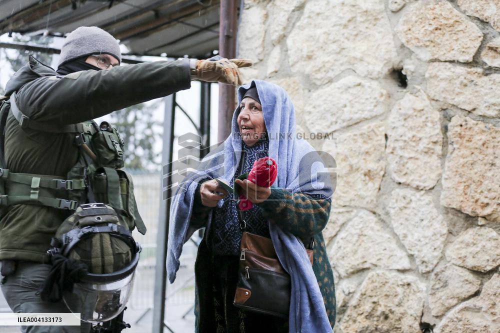 Muslims cross Israeli checkpoint for first Friday of Ramadan - Bethlehem
