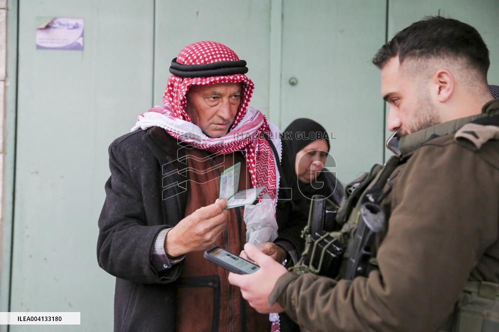 Muslims cross Israeli checkpoint for first Friday of Ramadan - Bethlehem