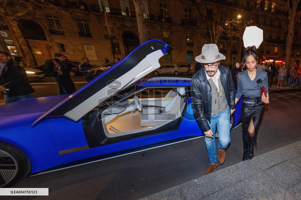 Zoe Saldana With Jaguar Type 00 electric concept car at Peninsula - Paris