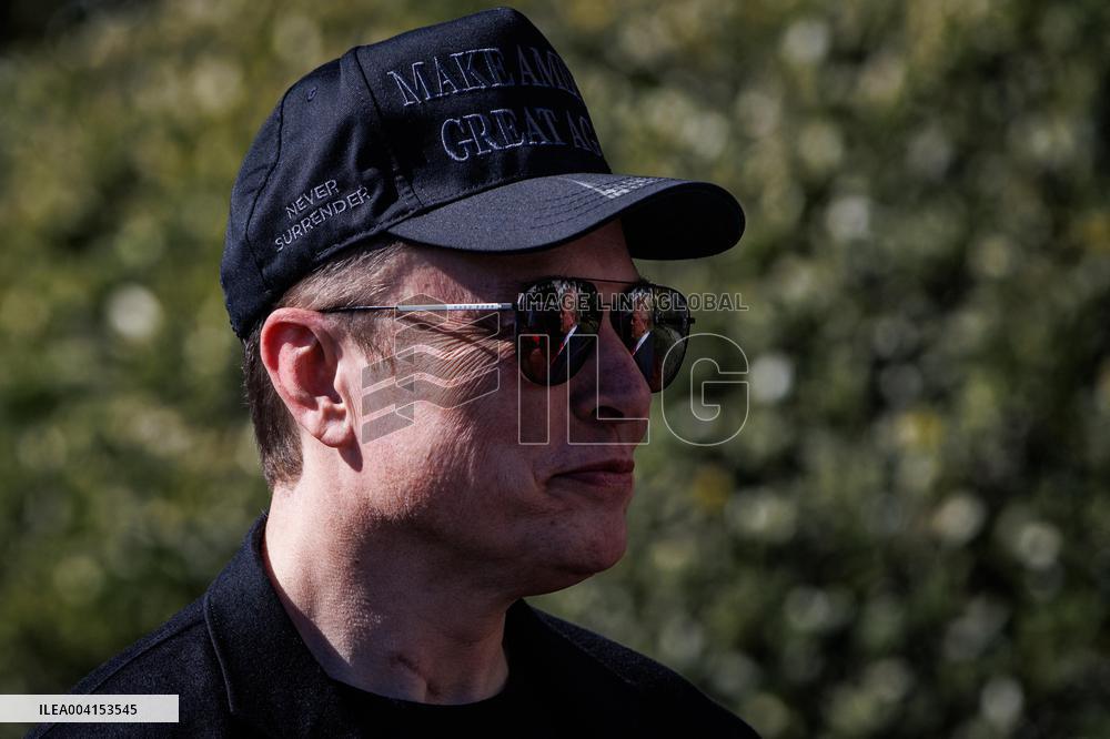 DC: President Trump views Tesla vehicles in Front of The White House