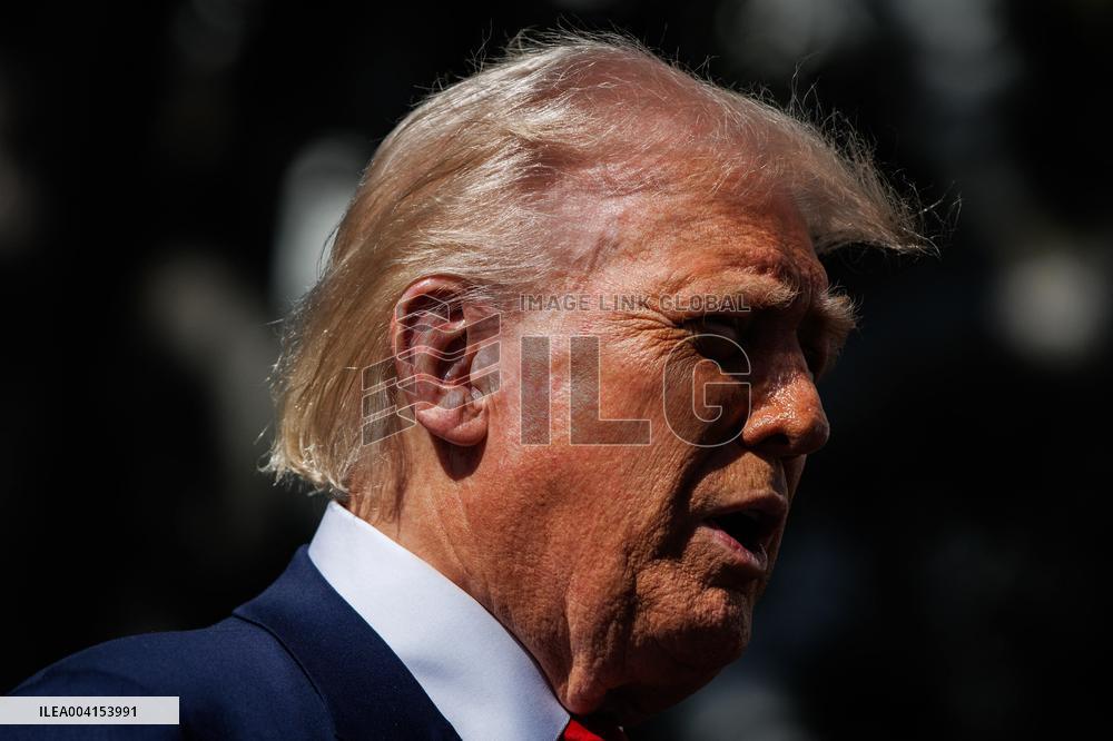 DC: President Trump views Tesla vehicles in Front of The White House