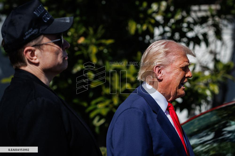 DC: President Trump views Tesla vehicles in Front of The White House