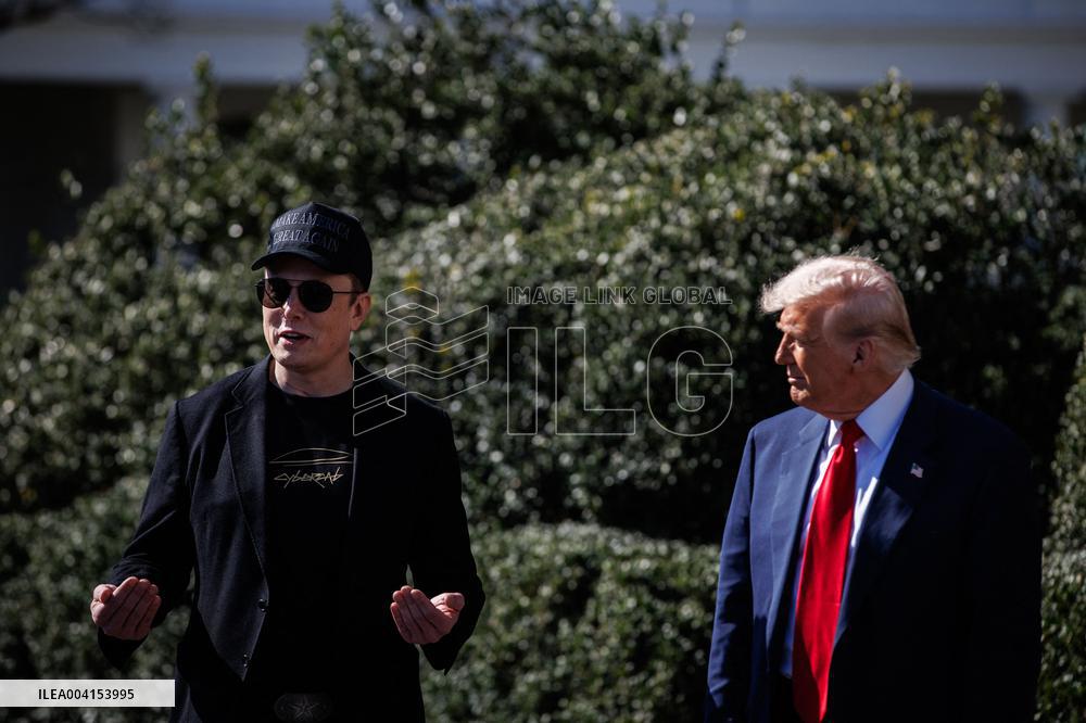 DC: President Trump views Tesla vehicles in Front of The White House