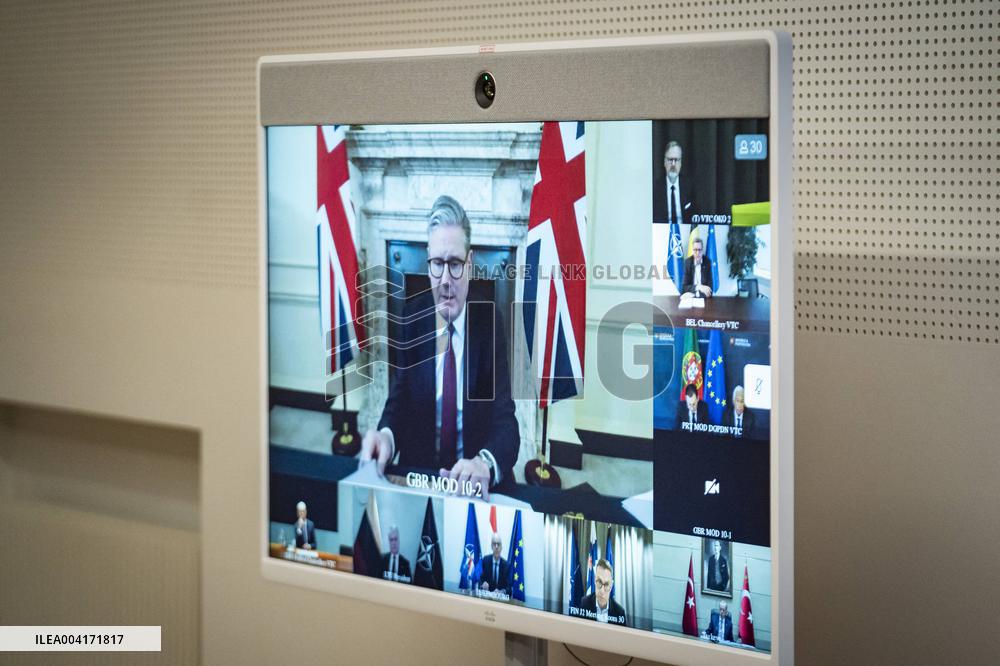 President Macron takes part in a videoconference for peace and security in Ukraine