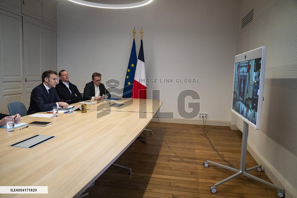 President Macron takes part in a videoconference for peace and security in Ukraine