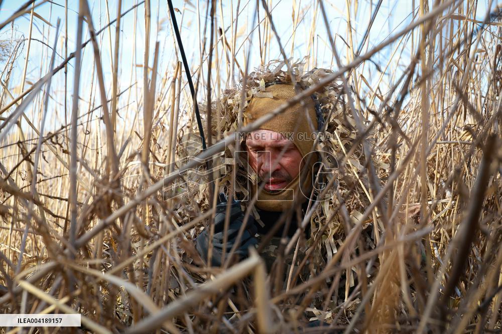 Soldiers of 40th Separate Coastal Defense Brigade practice landing from motorboats