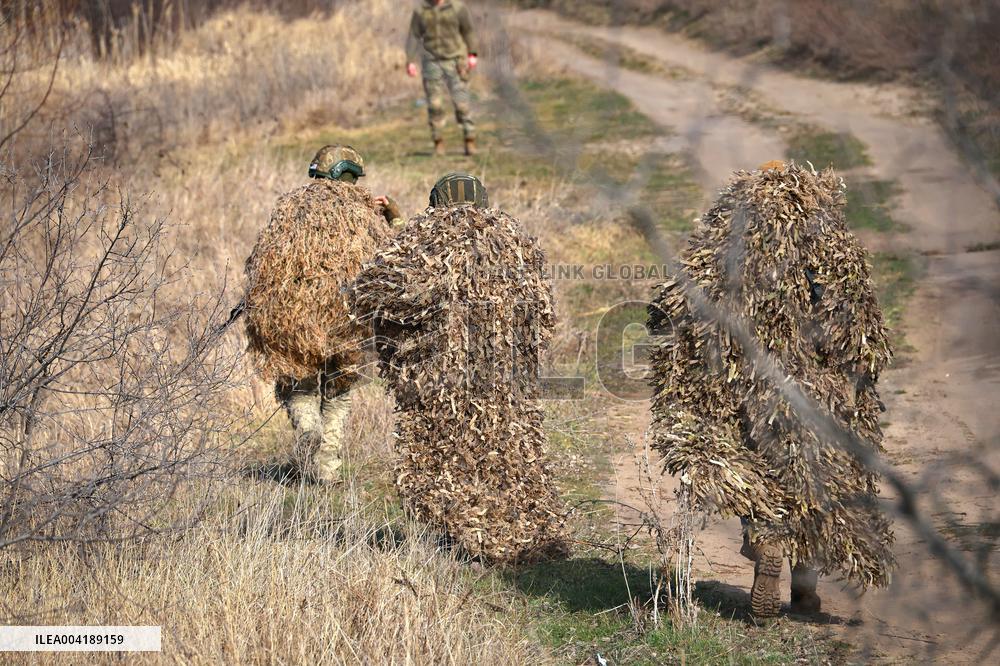Soldiers of 40th Separate Coastal Defense Brigade practice landing from motorboats