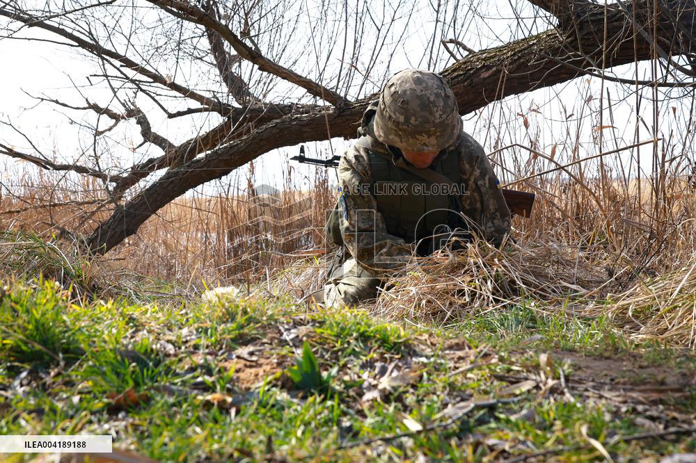 Soldiers of 40th Separate Coastal Defense Brigade practice landing from motorboats
