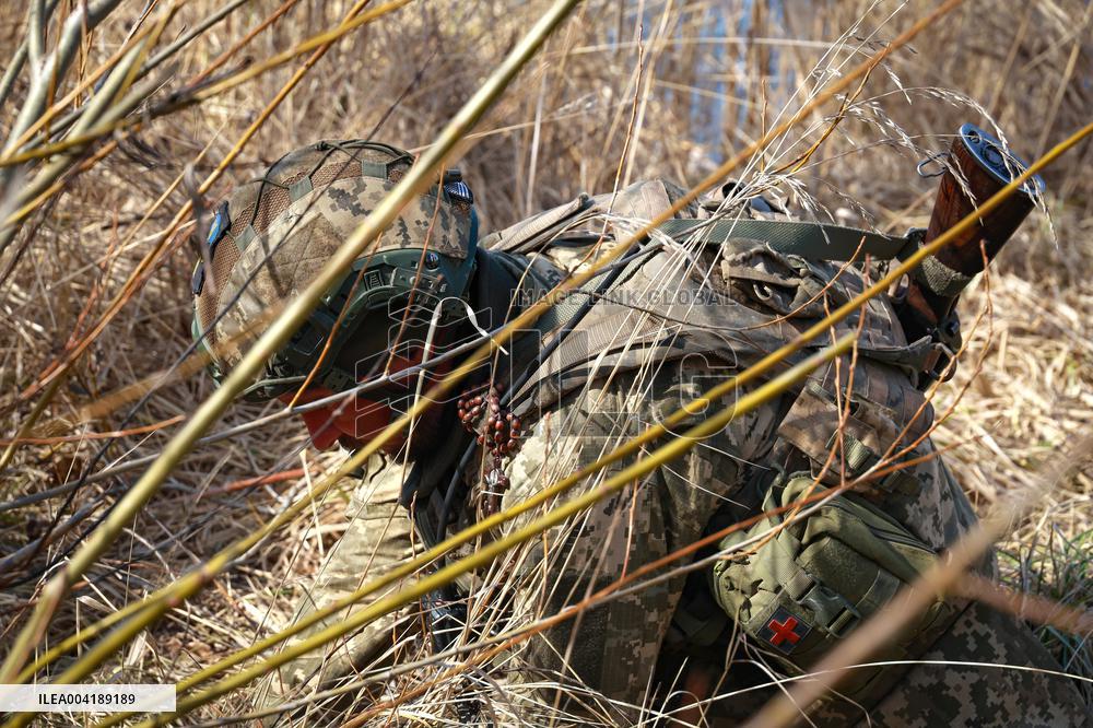 Soldiers of 40th Separate Coastal Defense Brigade practice landing from motorboats