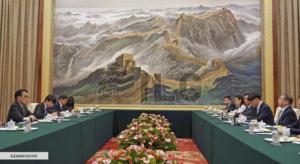 Japan opposition lawmaker in Beijing