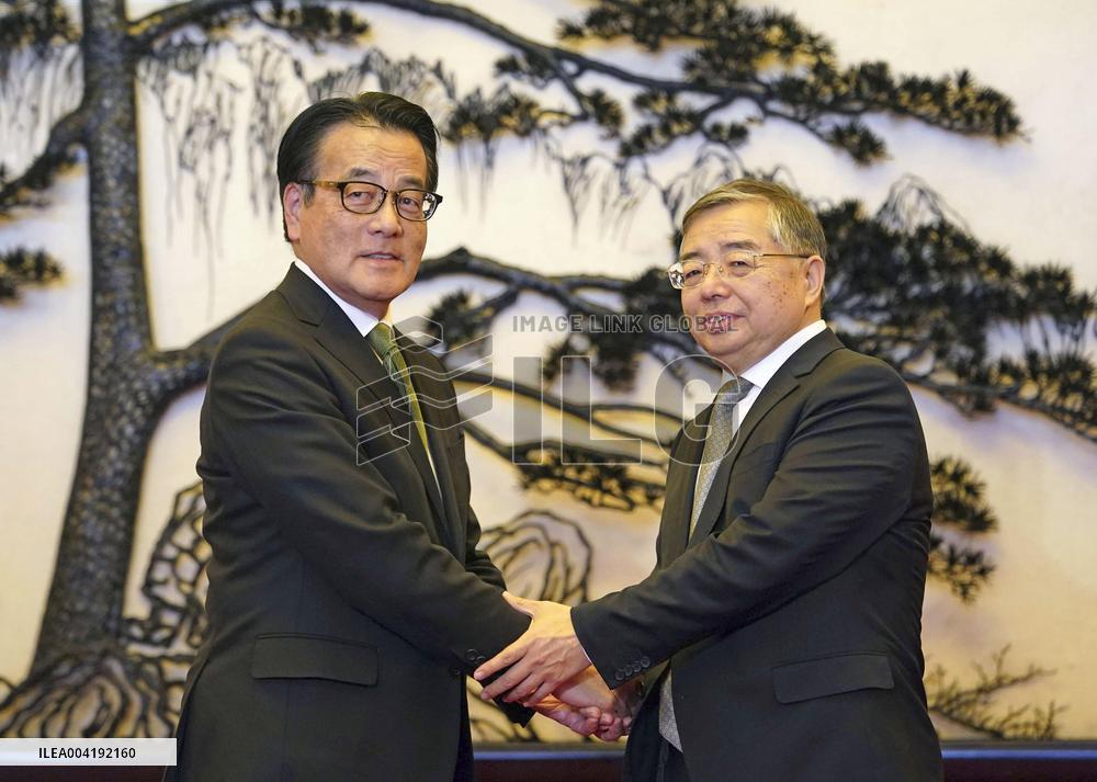 Japan opposition lawmaker in Beijing