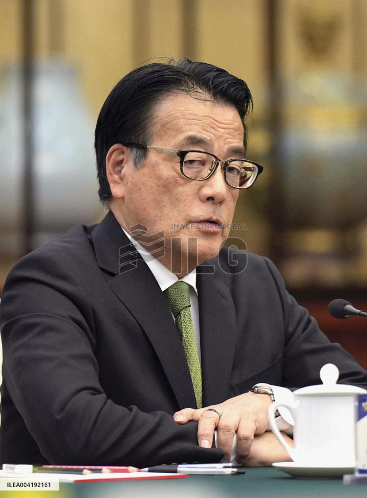 Japan opposition lawmaker in Beijing