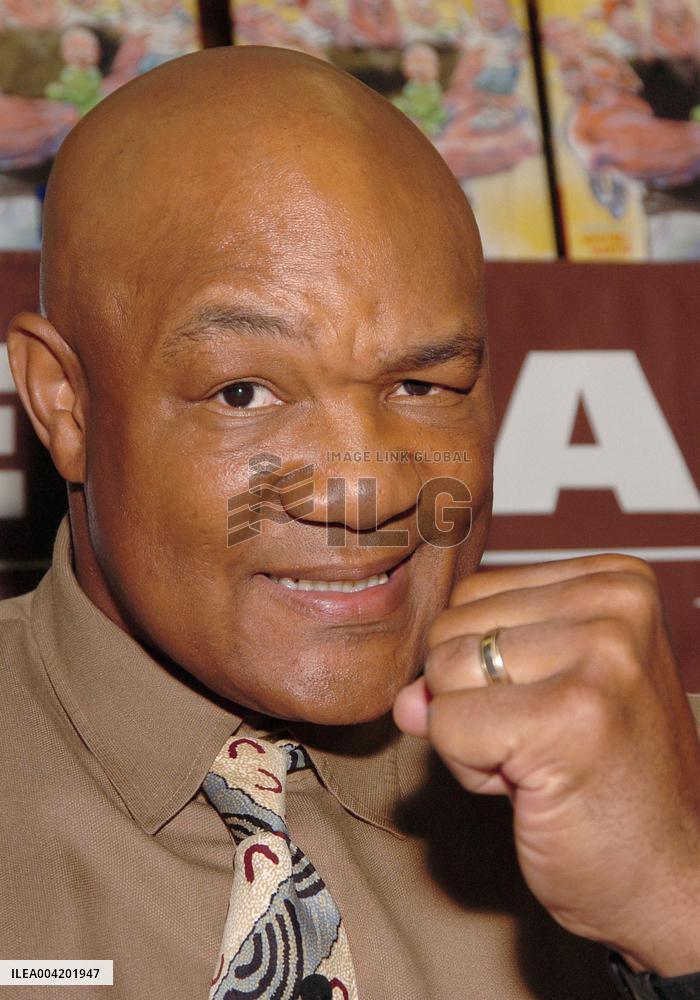 George Foreman Signs his children's Book ' Let George Do It! ' in New York City