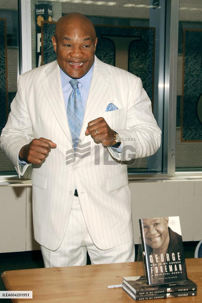 George Foreman Signs  God In My Corner - New York City