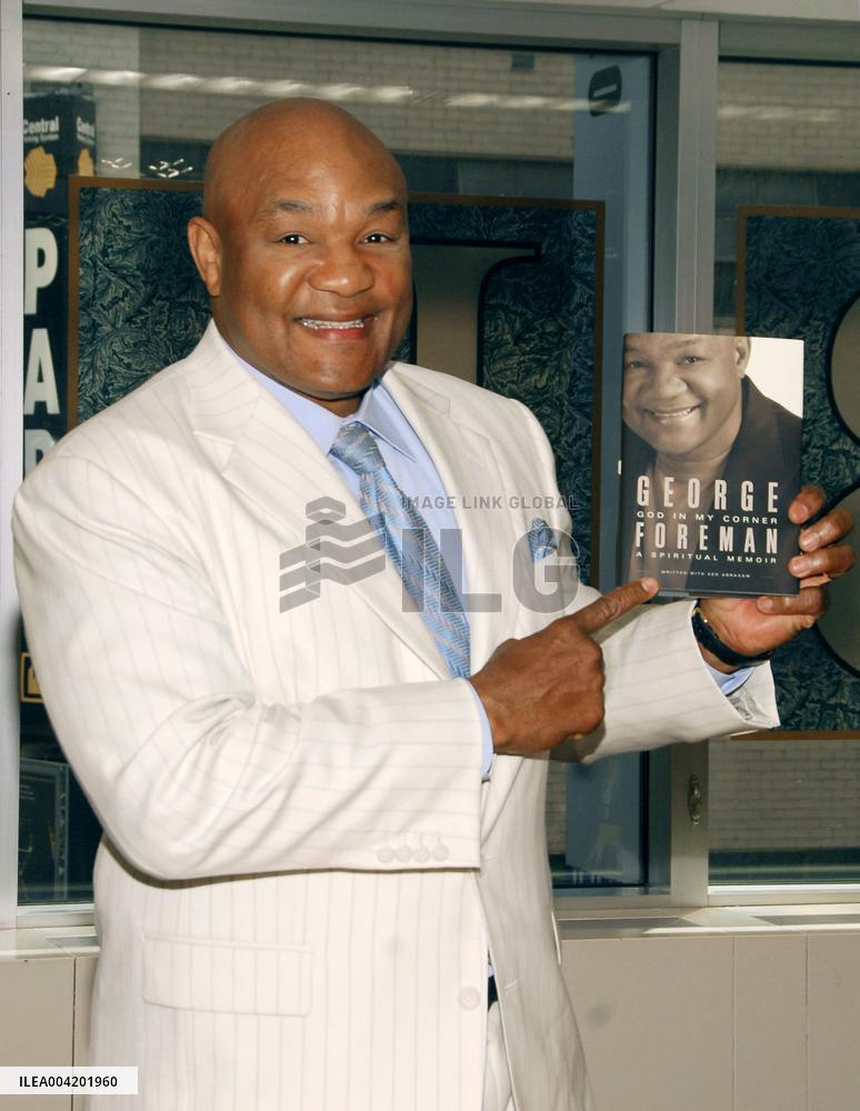 George Foreman Signs  God In My Corner - New York City