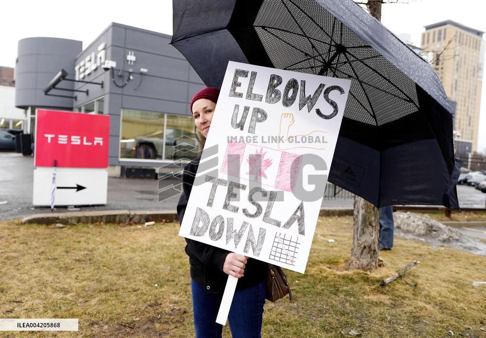 Protest Rally Outside A Telsa Dealership In Ottawa