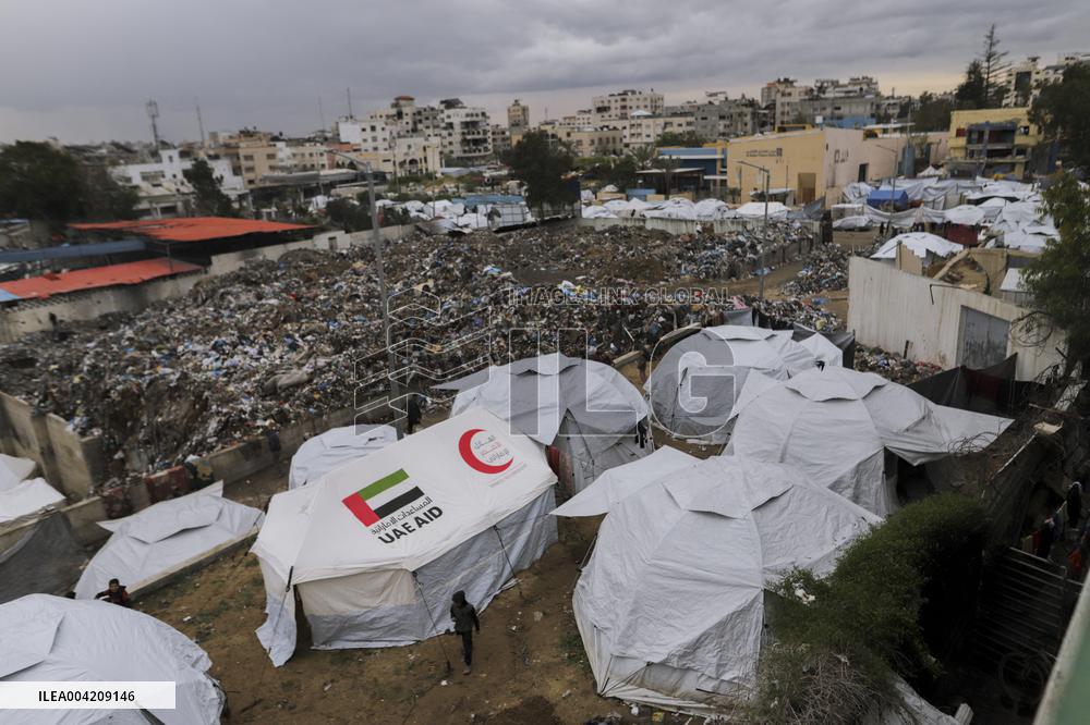 Displaced Palestinians live in partially demolished buildings - Gaza