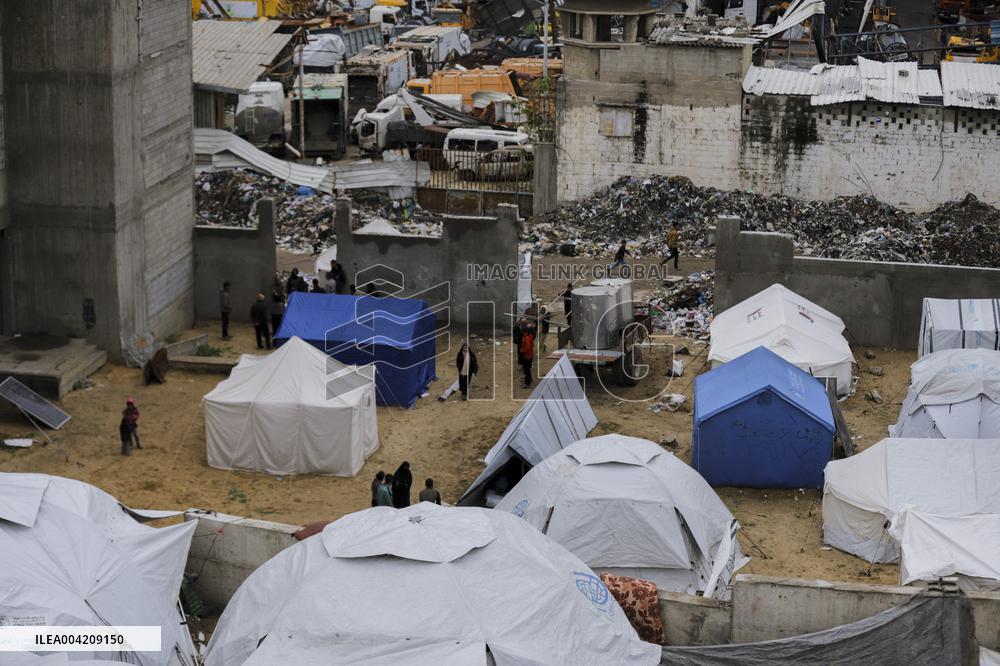 Displaced Palestinians live in partially demolished buildings - Gaza