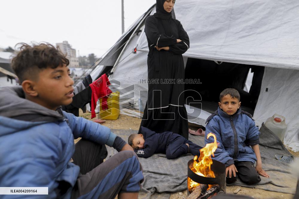 Displaced Palestinians live in partially demolished buildings - Gaza