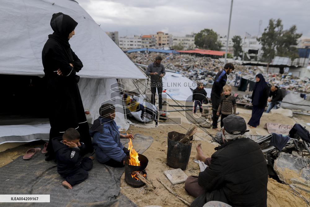 Displaced Palestinians live in partially demolished buildings - Gaza