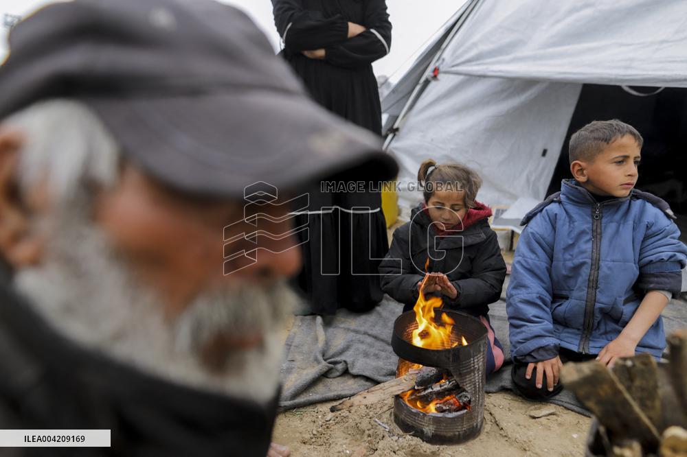 Displaced Palestinians live in partially demolished buildings - Gaza