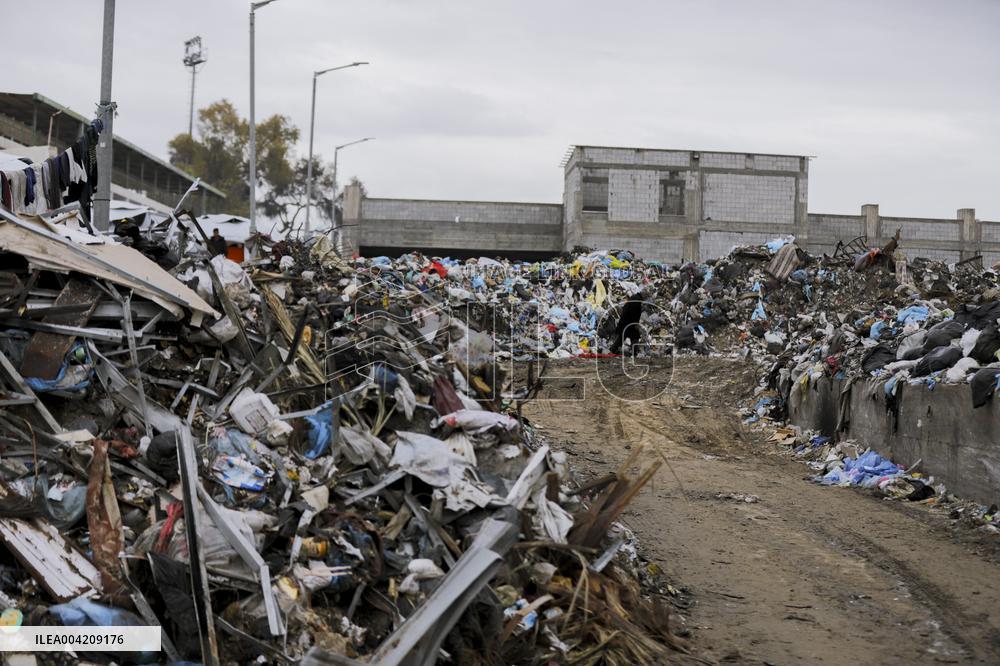 Displaced Palestinians live in partially demolished buildings - Gaza